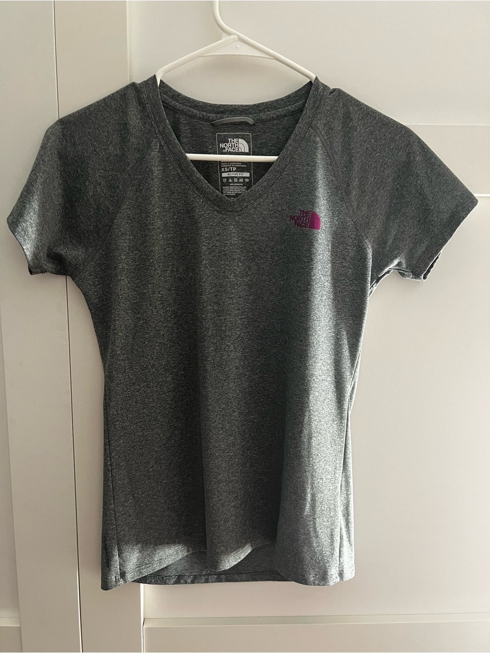 The North Face Women's Charcoal V-Neck Short Sleeve Tee with Purple Logo